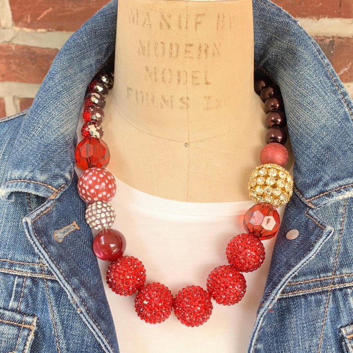 Red necklace with large red beads strung together. Red statement necklace for women.