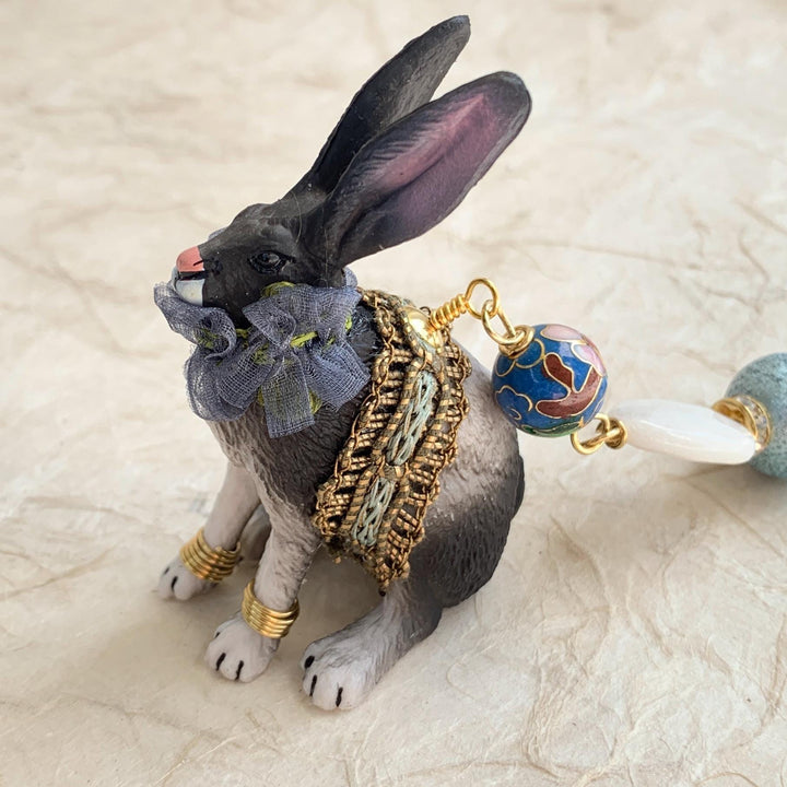 Long eared bunny bag charm with floral ribbon embellishments. Blue beaded rabbit purse charm.