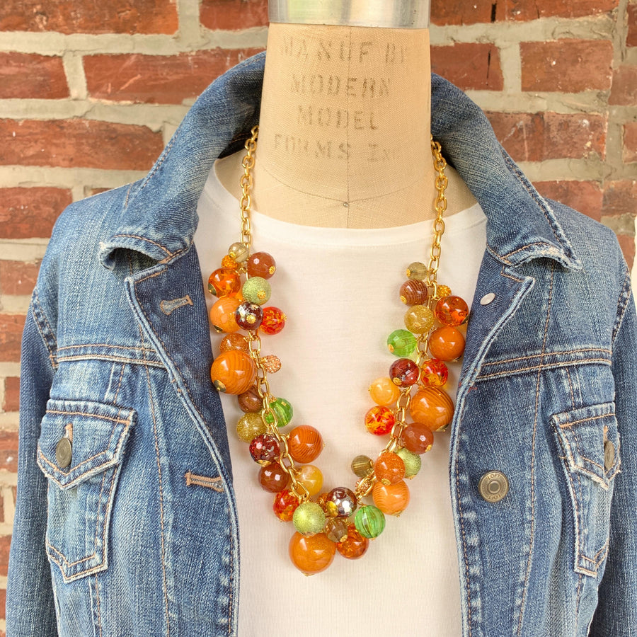 Chunky beaded necklace in fall colors for women. Orange statement necklace. 