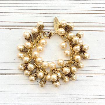 Gold charm bracelet with pearls. Pearl bridal party jewelry.