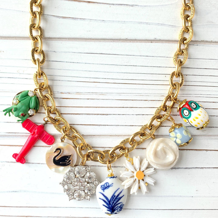 Trendy gold chain charm necklace.