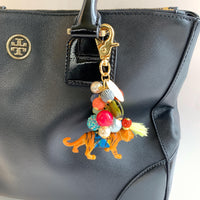 Tiger bag charm with gold trigger clasp, colorful mix of beads and embellished miniature tiger figurine.