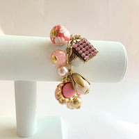 Pink bracelet for women. Gold charm bracelet with pink and gold charms. Valentines gift for her.