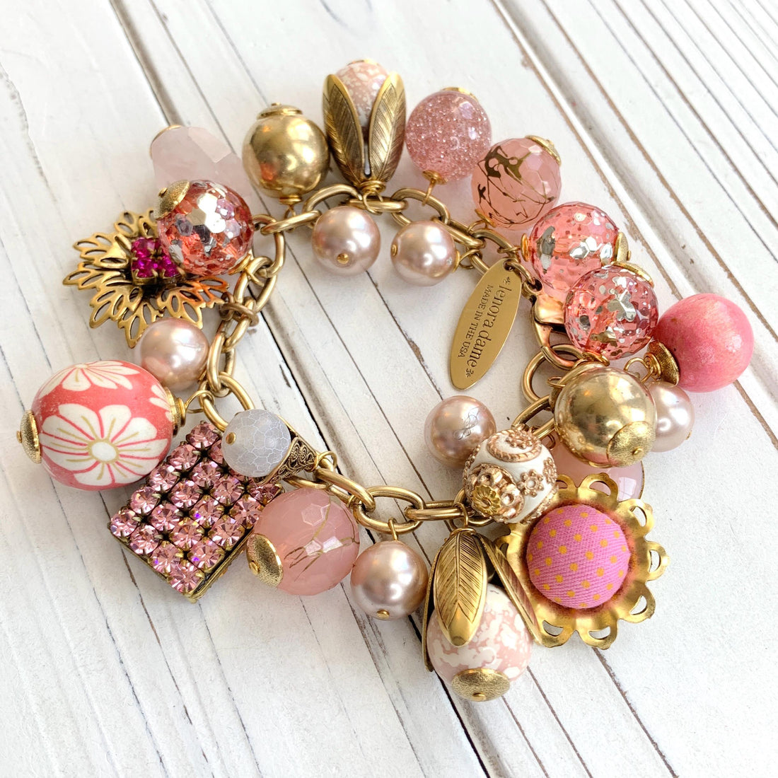 Pink bracelet for women. Gold charm bracelet with pink and gold charms. Valentines gift for her.