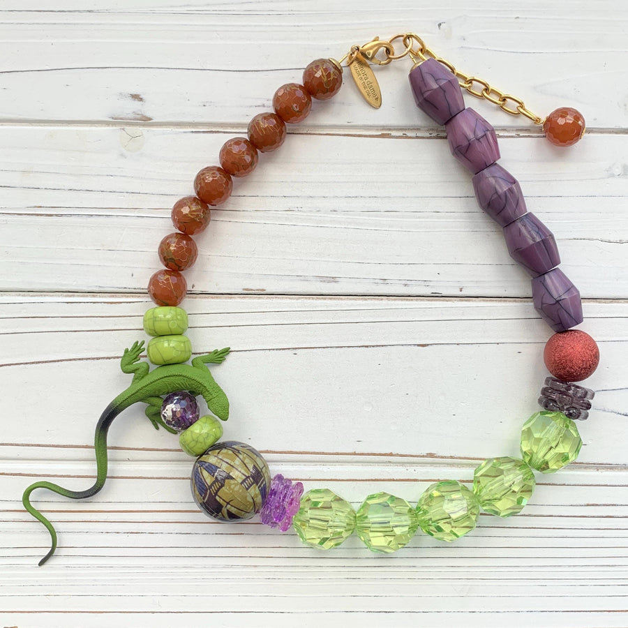 Lizard necklace with green, purple, and brown beads. Purple and green statement necklace for women.