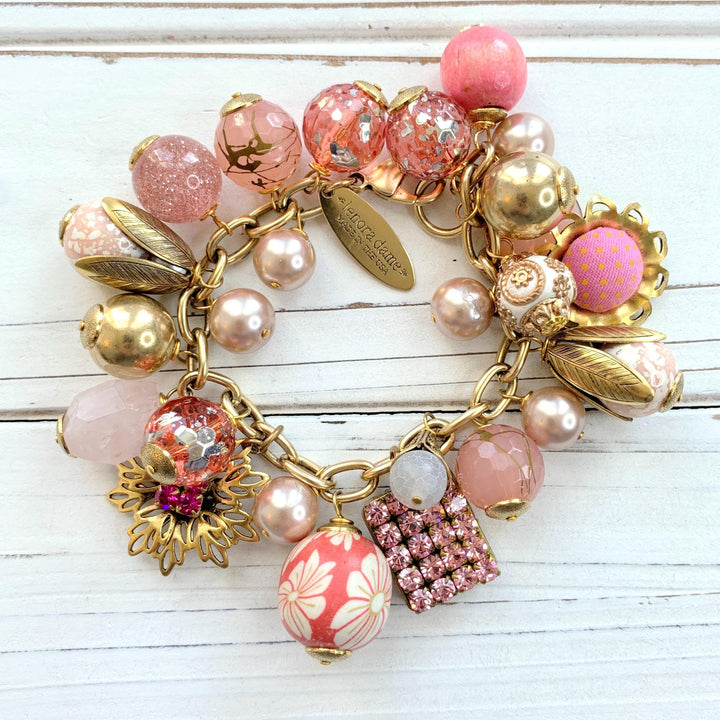 Pink bracelet for women. Gold charm bracelet with pink and gold charms. Valentines gift for her.